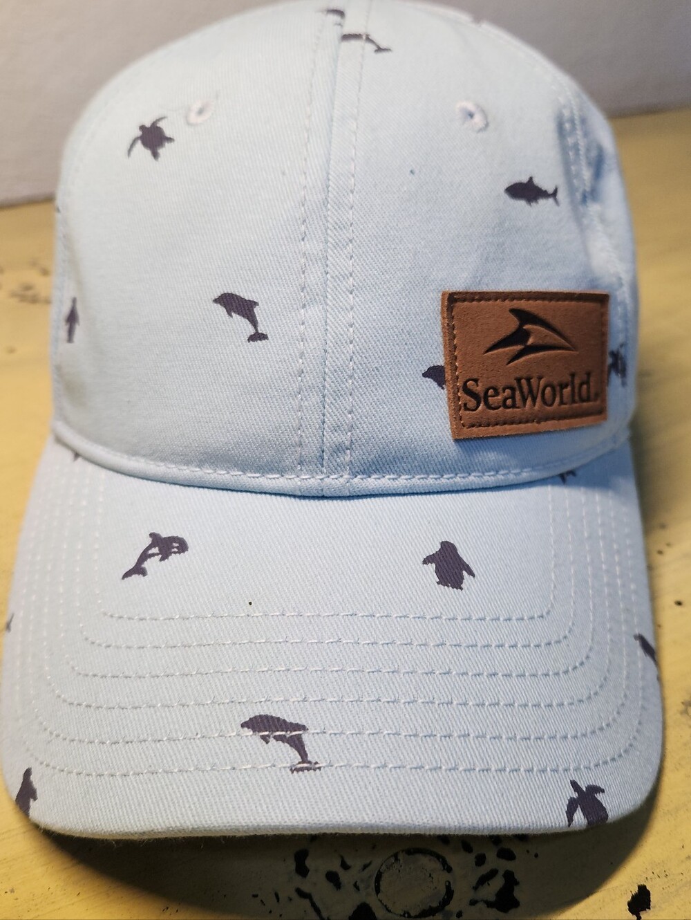 Make a splash with this brand new, authentic SeaWorld Leather Patch Baseball Cap